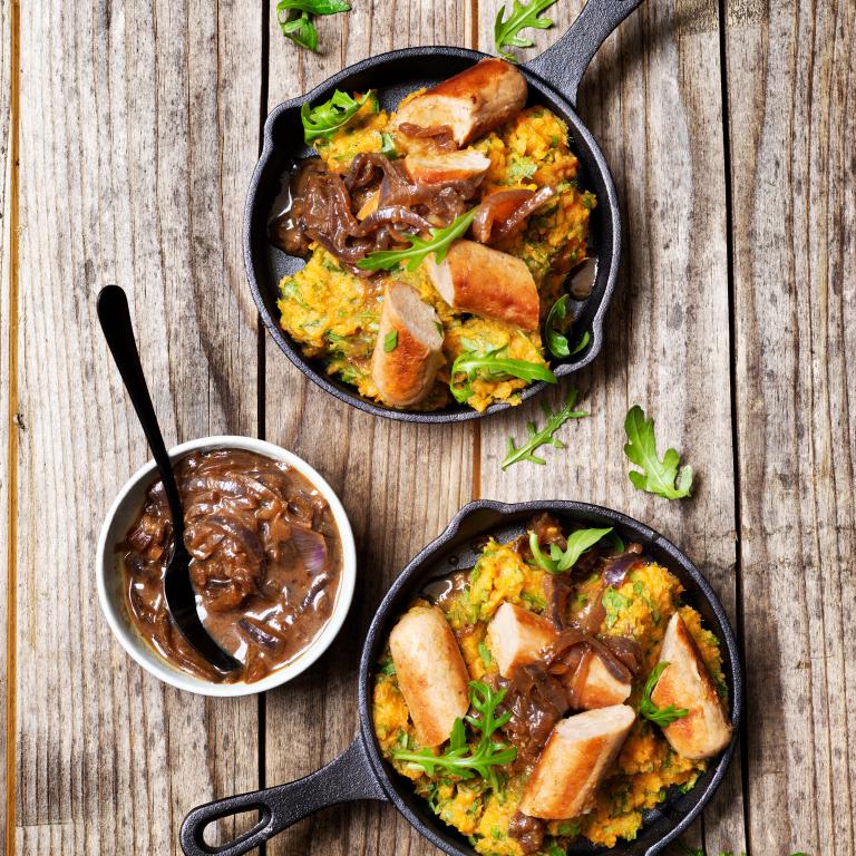 Bratwurst with sweet potato and onion-mustard gravy